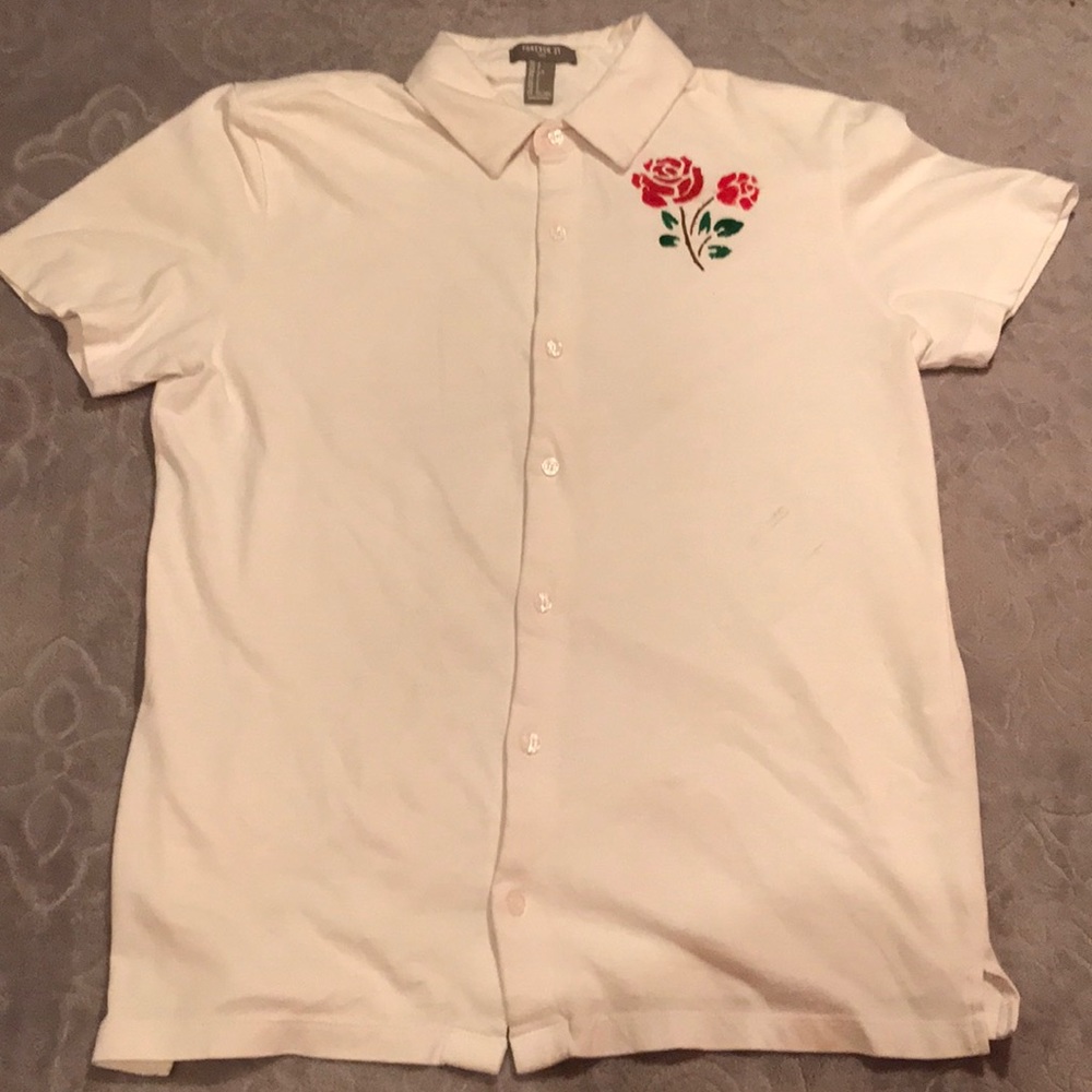 A white button up tee also men and women